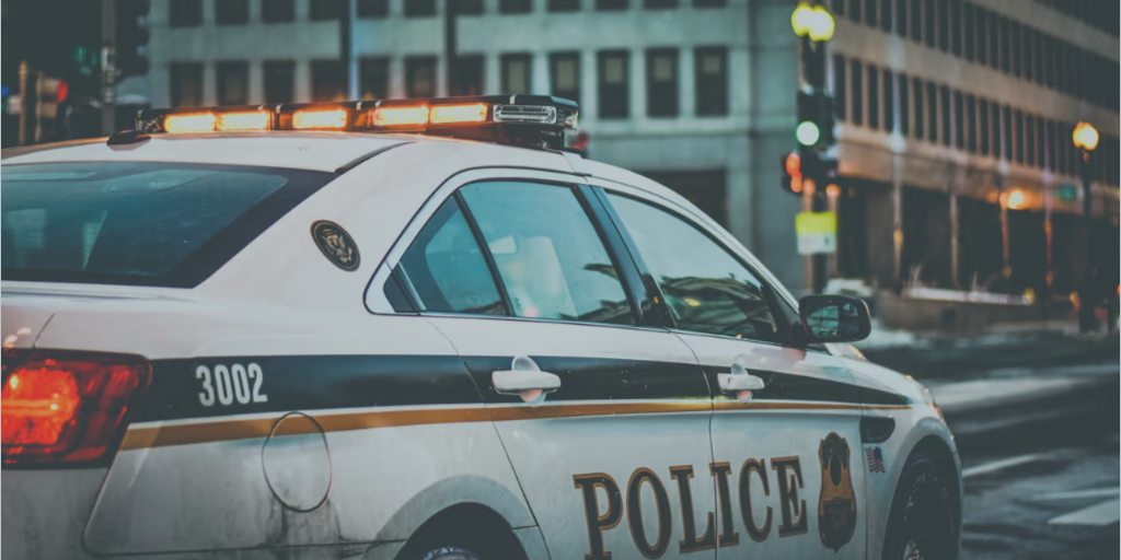 A police car on a city street.